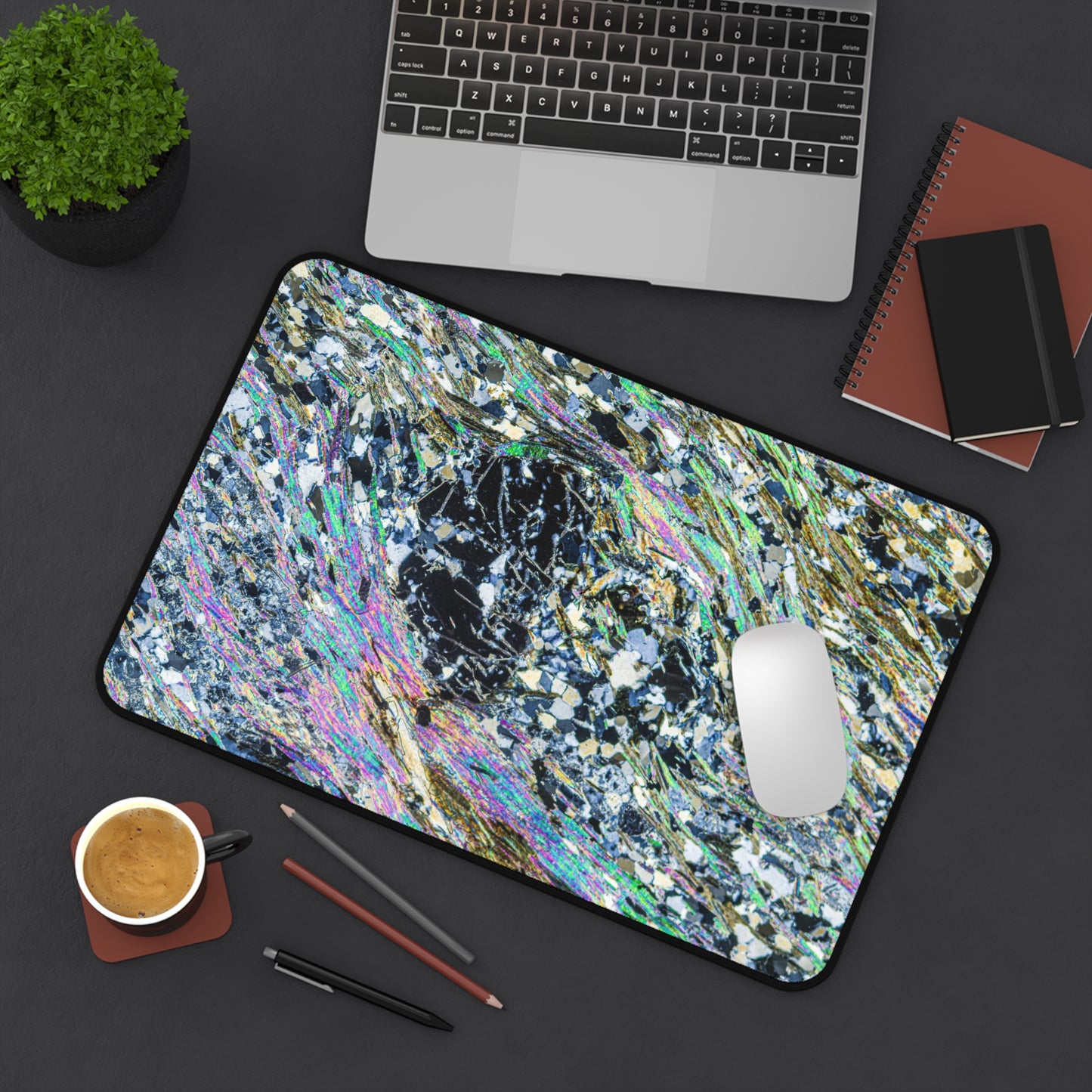 Metamophosing Garnet Rock Desk Mat